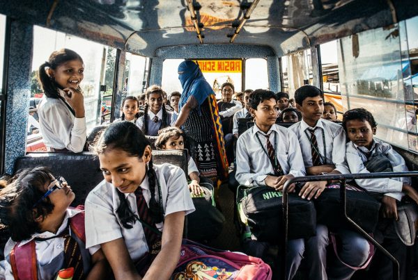 Focus Photography of Children on a School Bus