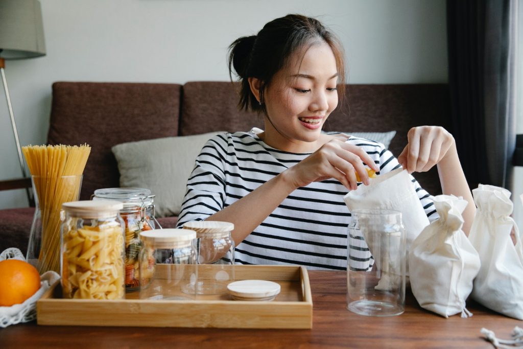 Person Opening Eco-Friendly Packaging of Pasta